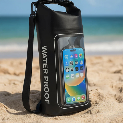 Black waterproof phone case with a smartphone on a sandy beach