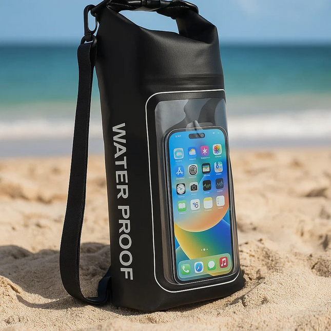 Black waterproof phone case with a smartphone on a sandy beach
