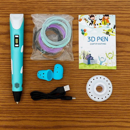 3D pen set with filament, USB cable, and packaging on a wooden surface