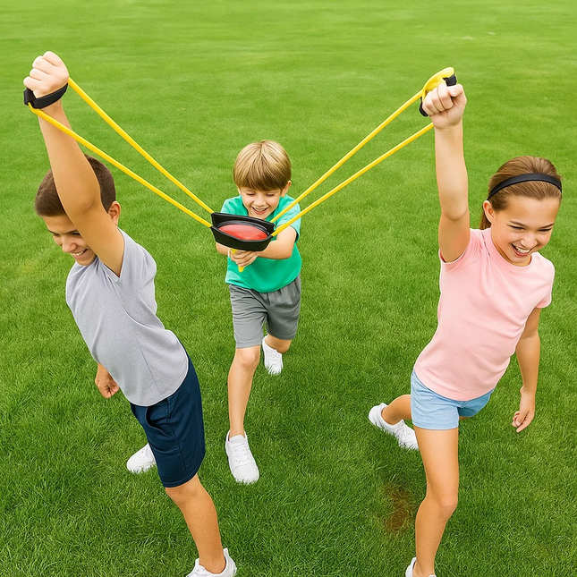 Three children exercising with sling shot on a grassy field
