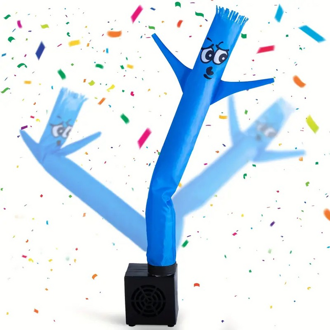 Funny mini air dancer waving next to a laptop on a work desk