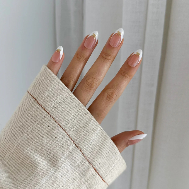 White Tip Gold Bow Gel Press-On Nails by pressing nails New Zealand
