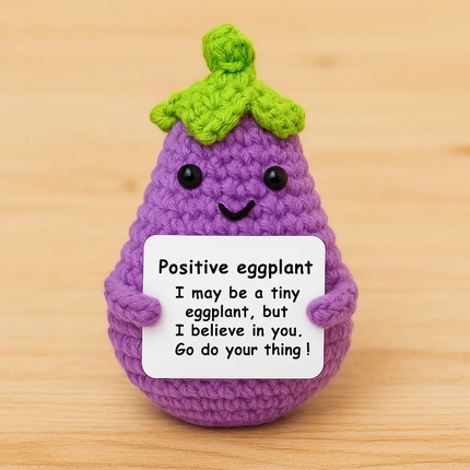 Crochet eggplant plush toy – holding a sign that says 'I may be a tiny eggplant but I believe in you' – cute handmade style gift – Lowkey.co.nz New Zealand gift store