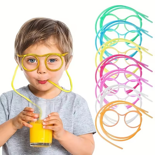 A child drinking from a glass using a flexible straw designed to look like glasses, with additional flexible straws shown in different colors in the background.