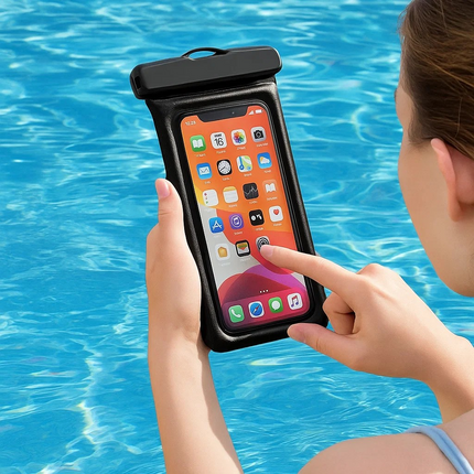 Person using a phone with a waterproof case by a pool