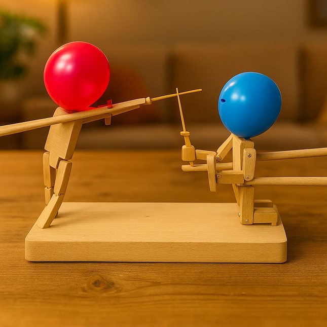 Wooden toy figures sword fighting game with red and blue balloons on a wooden base
